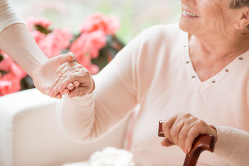 Woman holding someone's hand